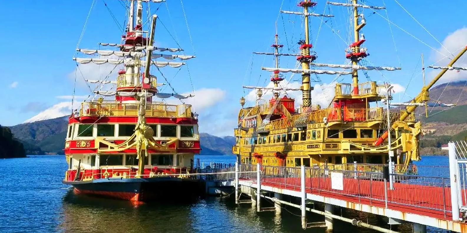 Sightseeing ships moored on Lake Ashi